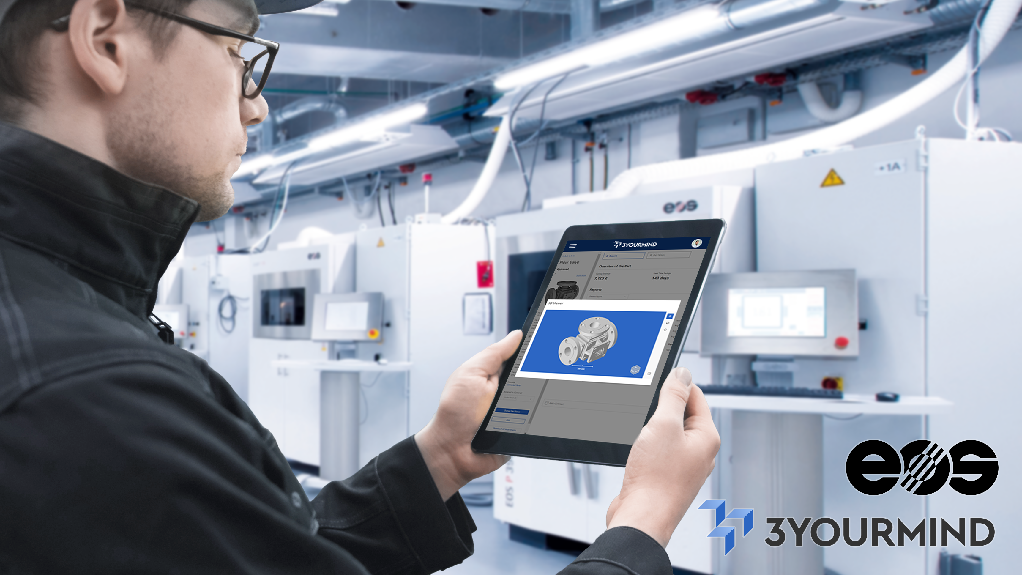 Man checking a part out on a tablet.